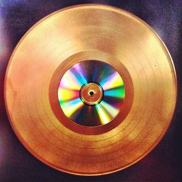 Gold Photograph - Gold Record by Chris Fabregas