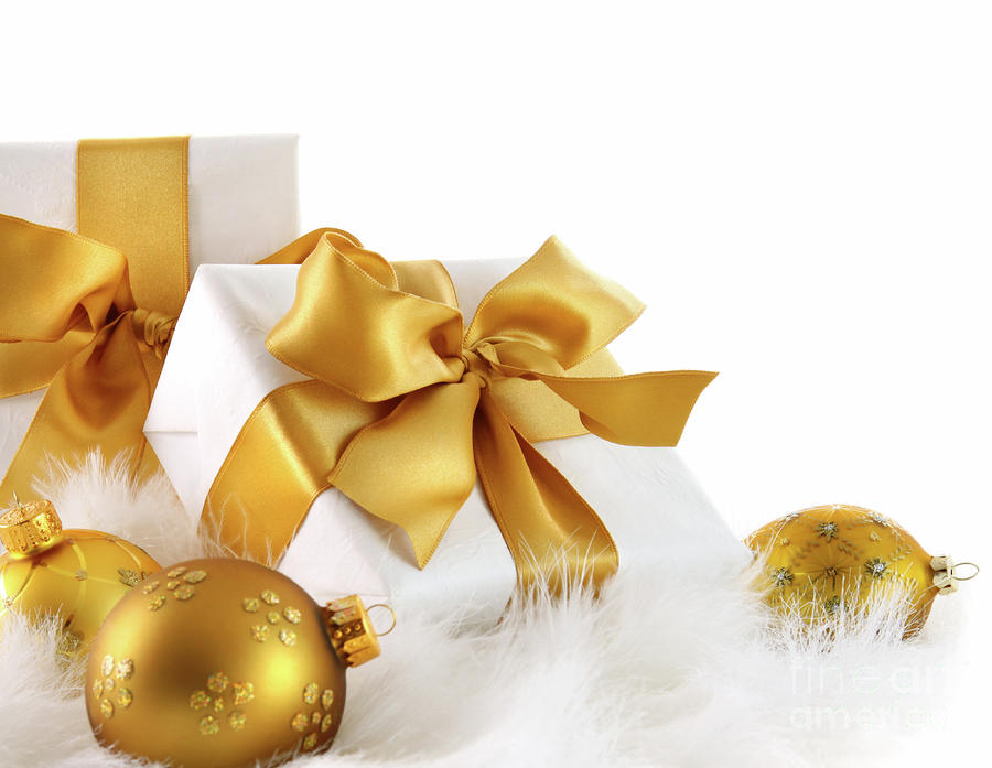 Gold ribboned gifts with christmas balls  Photograph by Sandra Cunningham