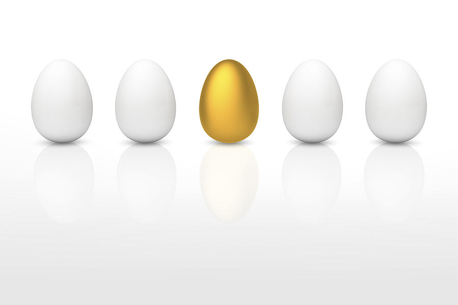 Golden Egg Between White Eggs by Bjorn Holland