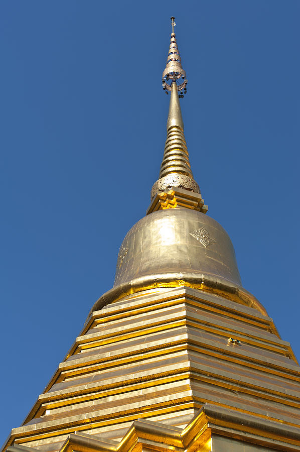 Golden roof of a temple in Thailand Photograph by U Schade