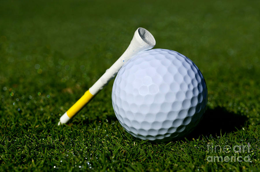 Golf ball and tee Photograph by Mats Silvan