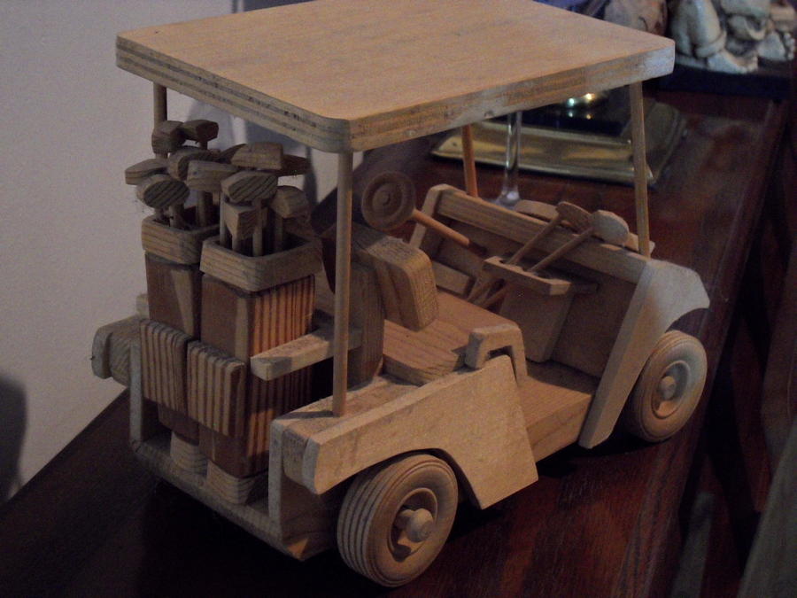 Golfcart-backview Sculpture by Val Oconnor