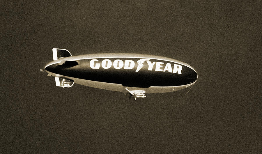 Black And White Photograph - Good Year Blimp by Patrick Lynch