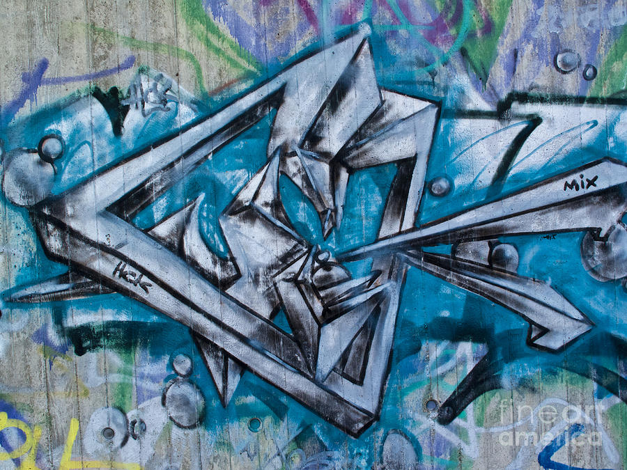 Graffito Art in blue Photograph by Heiko Koehrer-Wagner