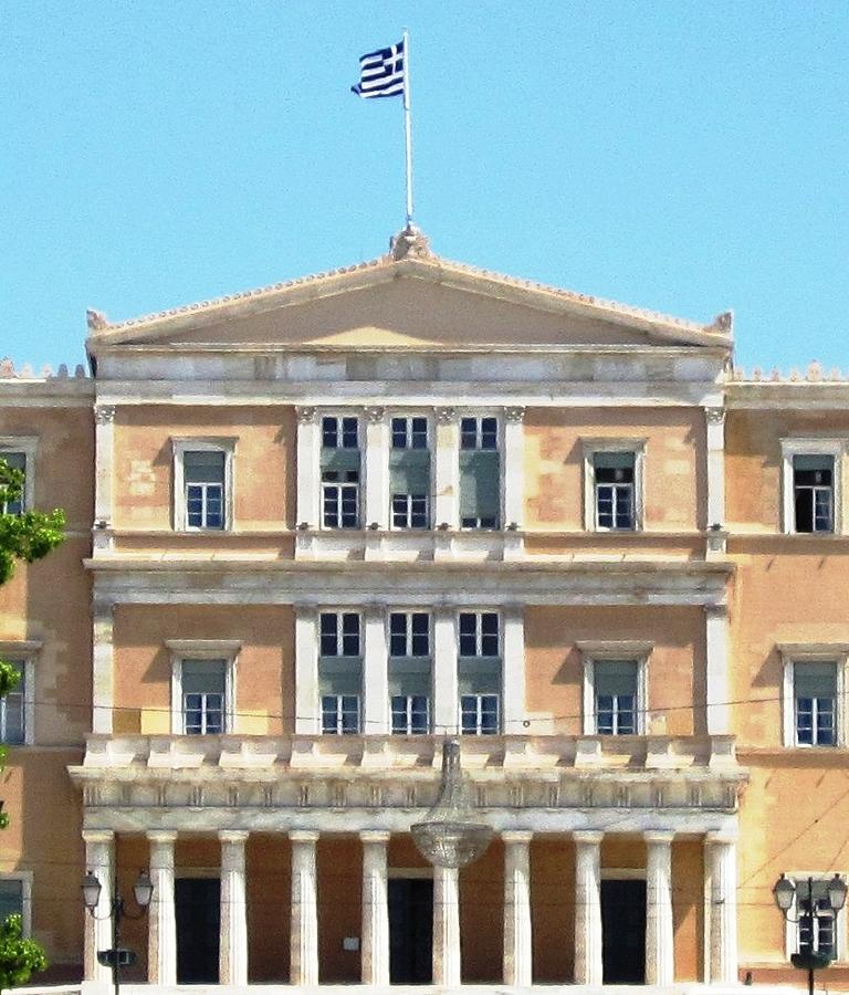 Greek Parliament Building and Flag in Athens Greece Photograph by John Shiron