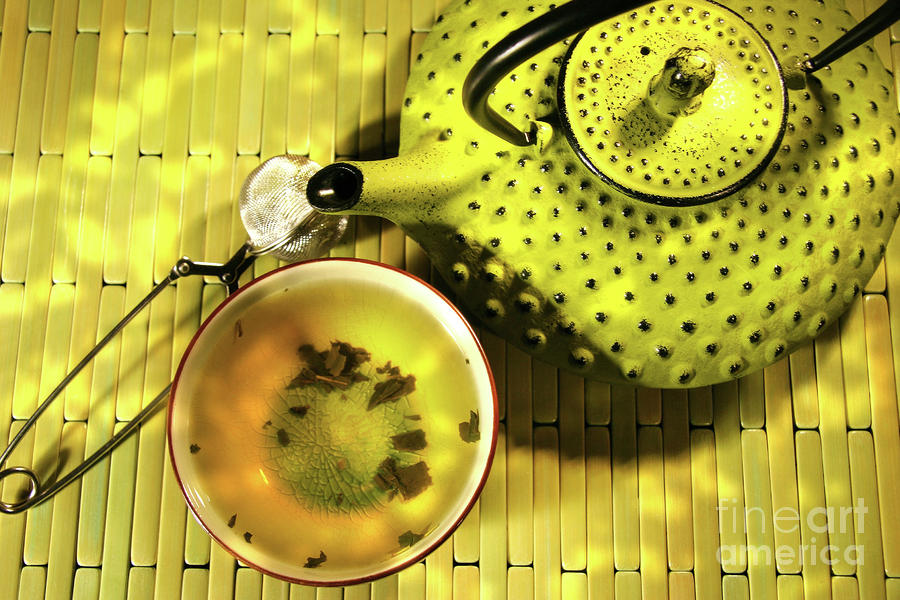 Green asian teapot with cup  Photograph by Sandra Cunningham