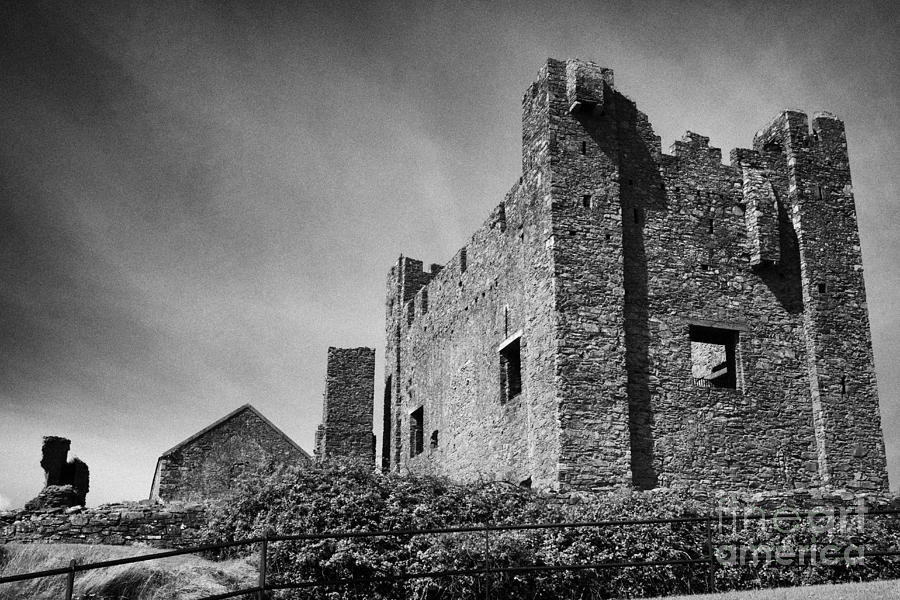 Castle Photograph - greencastle royal castle built by Hugh De Lacy to guard the entrance to Carlingford lough  by Joe Fox