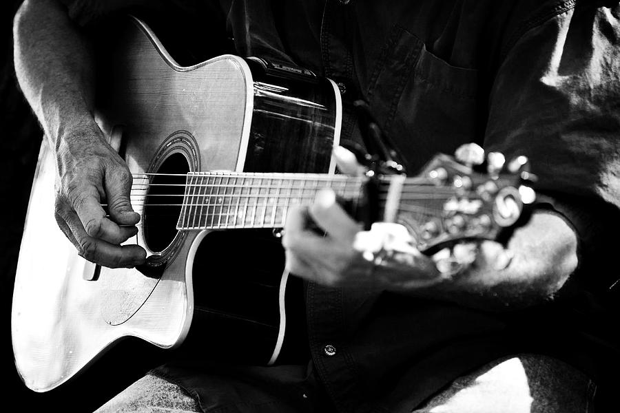 Black And White Photograph - Guitar Player by Paul Huchton