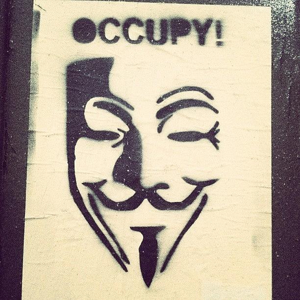 New York City Photograph - Guy Fawkes As Muse For Occupy Wall by Mariana L