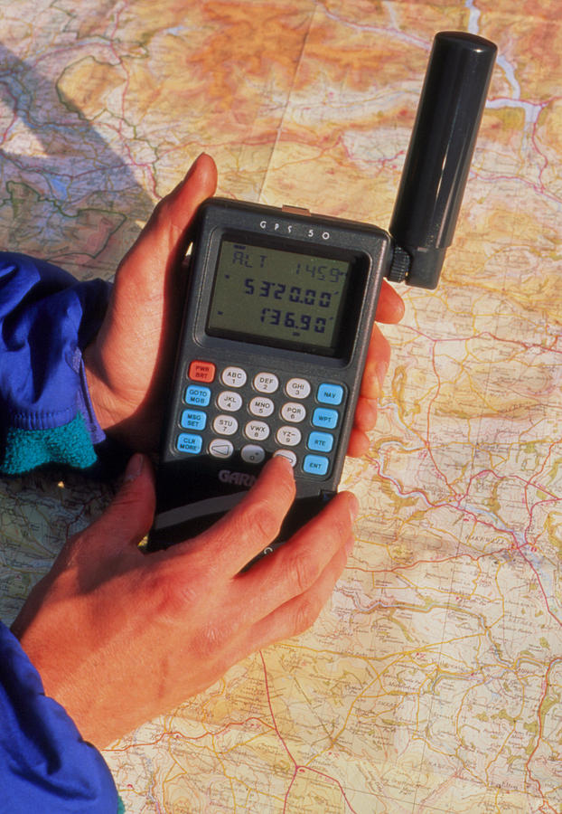 Handheld Gps Receiver And Map Photograph by David Parker Fine Art