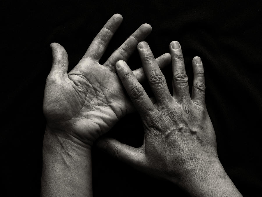 Hands On Black Background Photograph by Luigi Masella