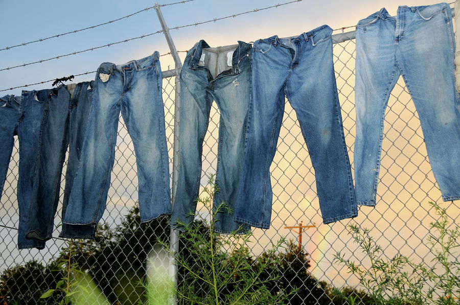Hang my jeans to dry Photograph by Arturo Rodriguez - Fine Art America