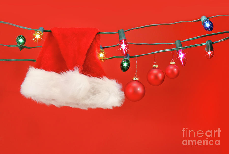 Christmas Photograph - Hanging lights with santa hat by Sandra Cunningham
