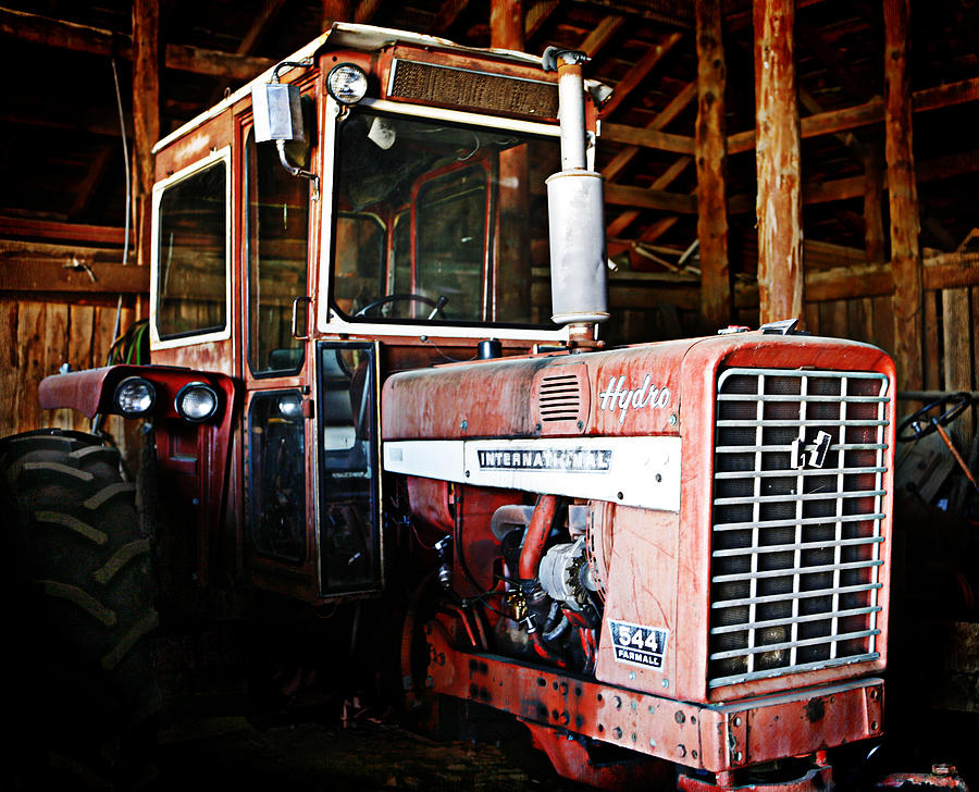 Happy Harvestor tractor Photograph by Marilyn Hunt