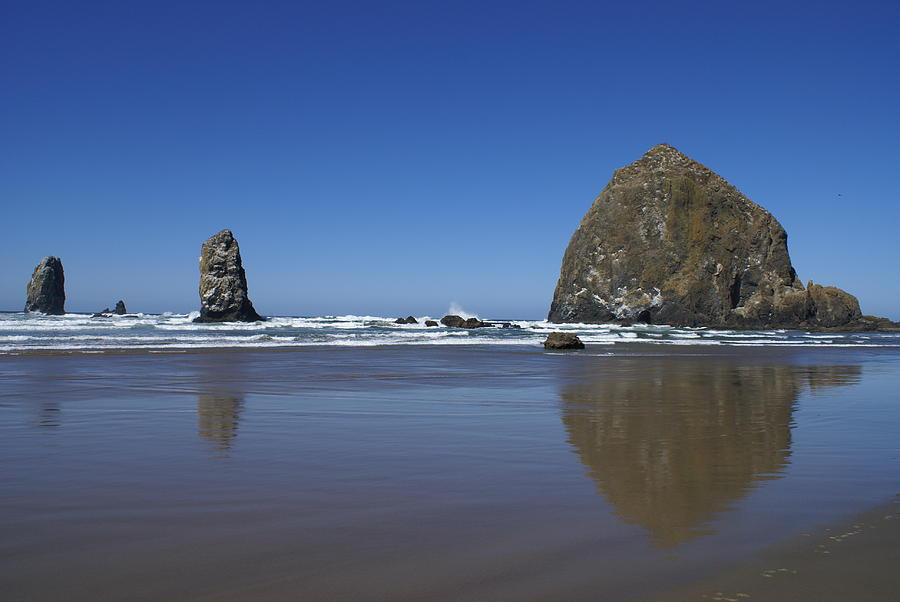Haystack Rock Photograph by Jerry Cahill