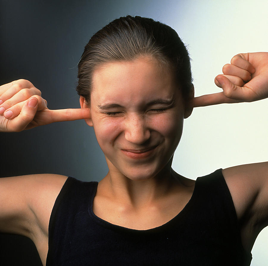Hearing Photograph - Hearing A Loud Sound: Girl Plugs Ears With Fingers by Phil Jude