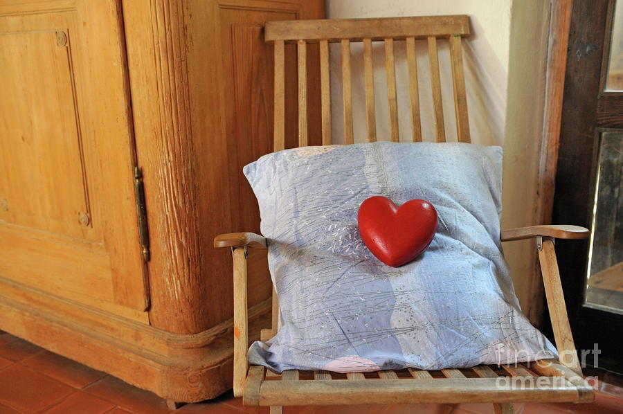 Valentines Day Photograph - Heartshape and pillow on wooden rocking chair by Sami Sarkis