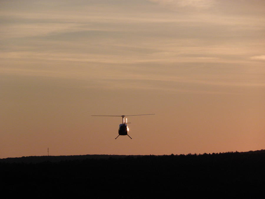 Helicopter Flyover At Sunset Photograph by Kim Galluzzo Wozniak
