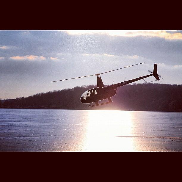 Nature Photograph - #helicopter Over The #frozen #lake In by Aran Ackley