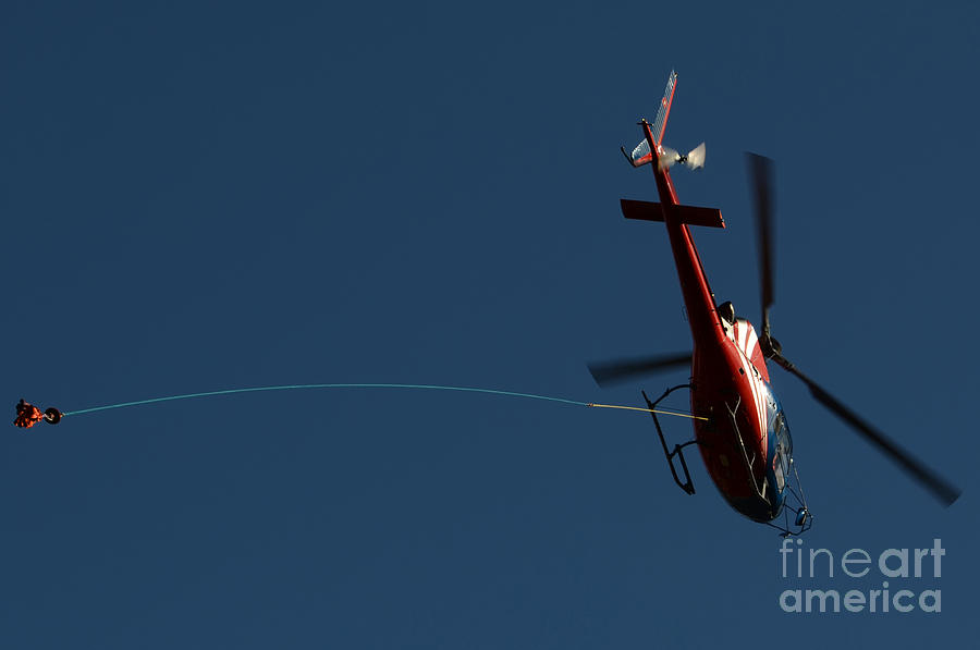 Helicopter with a hook Photograph by Mats Silvan