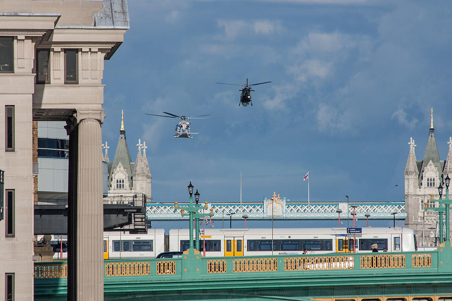 Helicopters Tower Bridge Photograph by Dawn OConnor - Fine Art America