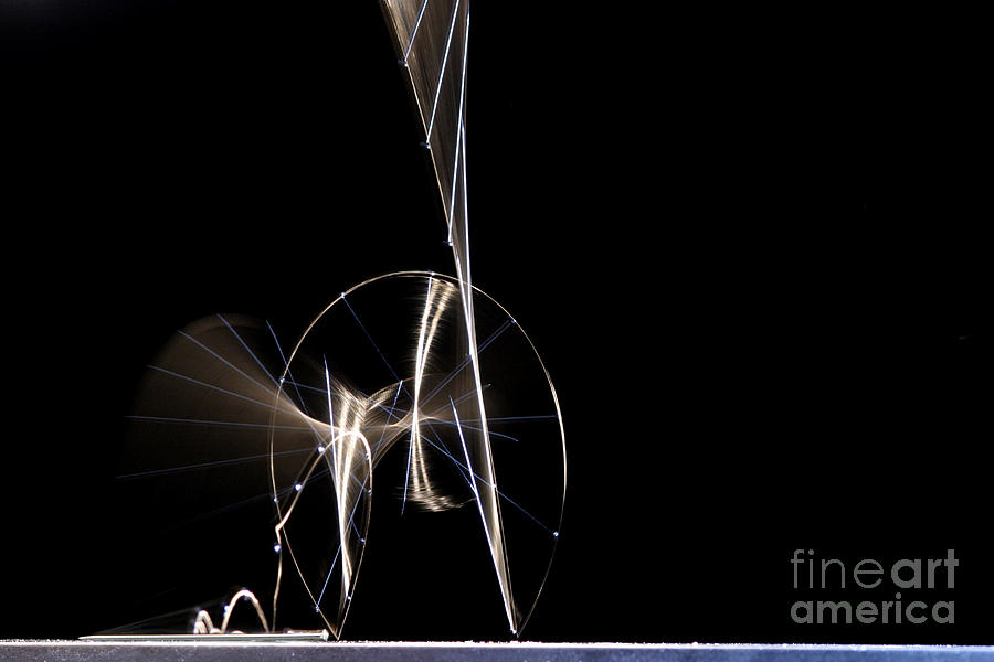 High Speed Strobe Image Of Pin Dropping Photograph by Ted Kinsman