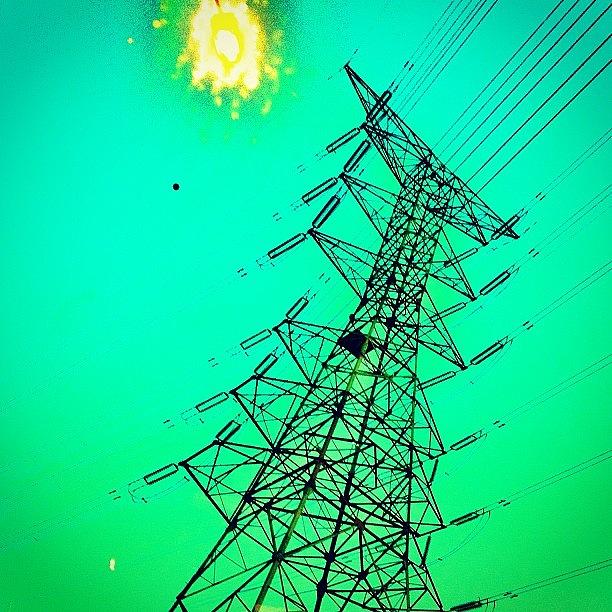 Sunset Photograph - High Voltage by Beatrice Looi