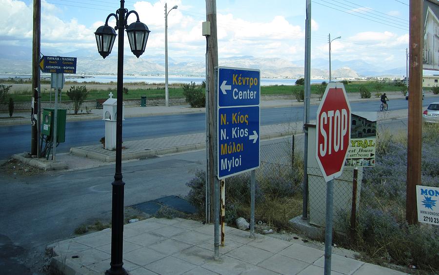 Highway Stop Sign and Road Signs While Driving Towards Nafplion in Greece Photograph by John Shiron