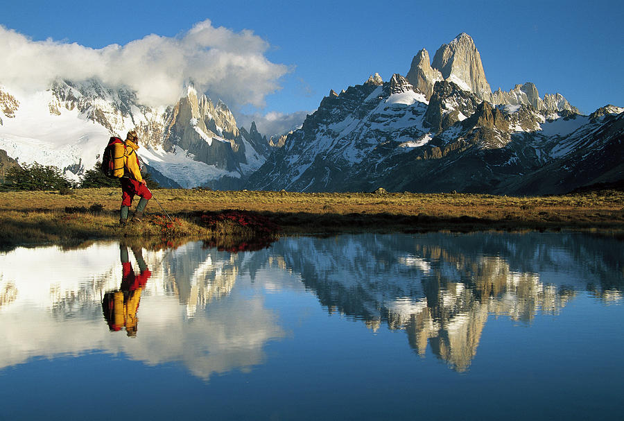 Hiker, Cerro Torre And Fitzroy by Colin Monteath 