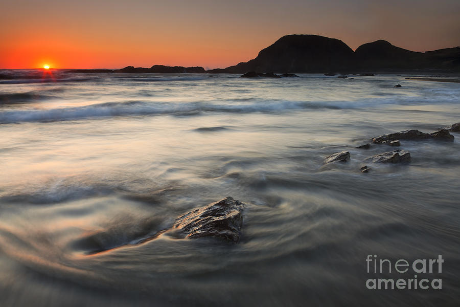 Sunset Photograph - Holding Back the Sea by Michael Dawson