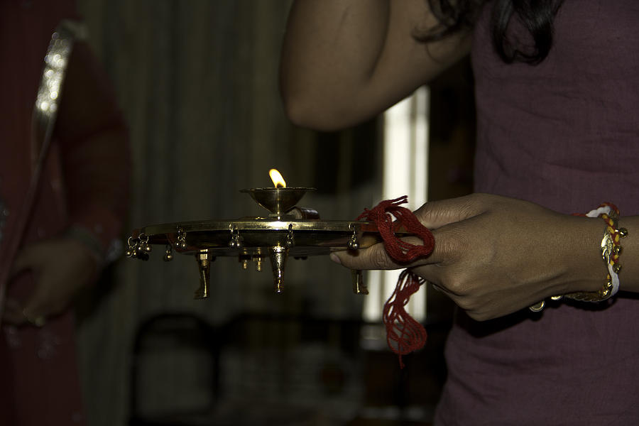Holding the raakhi plate Photograph by Ashish Agarwal