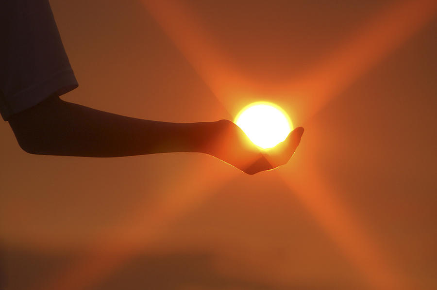 Holding The Sun Photograph by Sandra Sigfusson