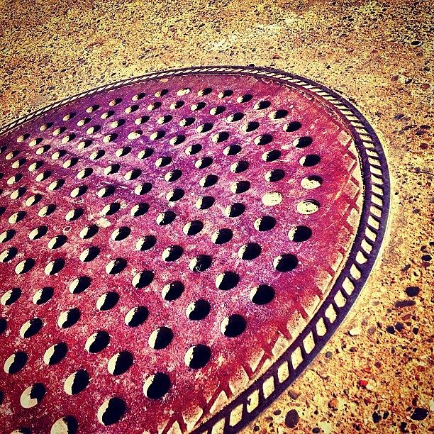 Architecture Photograph - Holy Man Hole Cover by Christopher Campbell