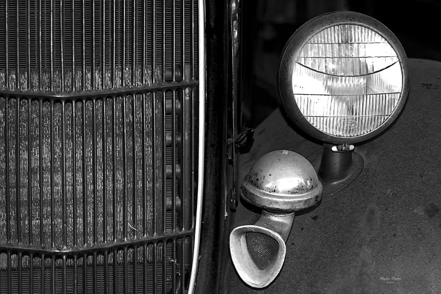 Horn And Headlight In Black And White Photograph by Phyllis Denton
