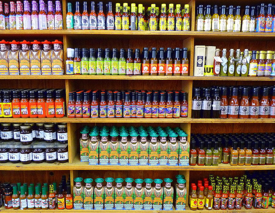 Hot Sauces Photograph by Jeff Lowe