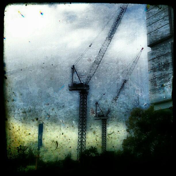 Crane Photograph - How To Grow A Building. #cranes by Paul Todd