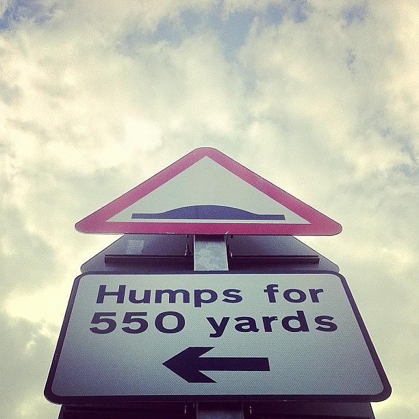 Sign Photograph - #hump #sign #lookup ##sky #clouds by Rob Jewitt