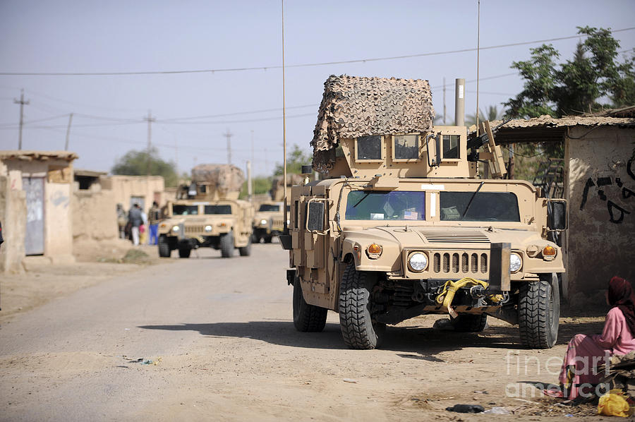 Humvees Conduct Security Photograph by Stocktrek Images