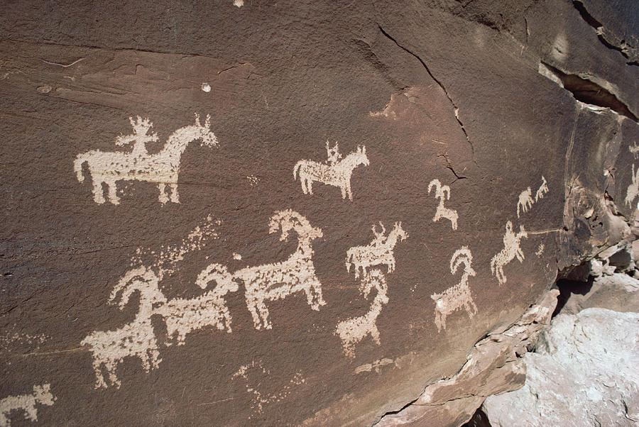 Hunting Party Petroglyphs At Wolfe Photograph by Gerry Ellis