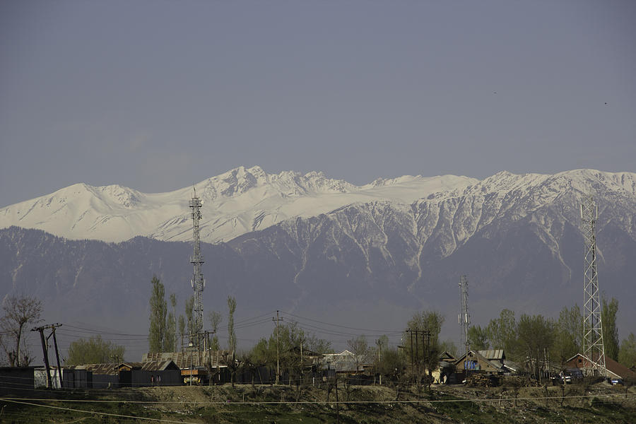 Ice capped mountains as visible in Srinagar Photograph by Ashish Agarwal