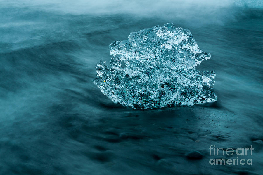 Iceberg ice on Black Sand Beach Photograph by Levin Rodriguez