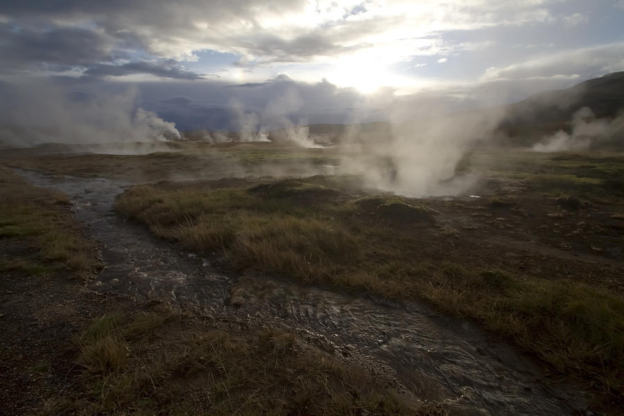 Icelandic hot springs near sun down Photograph by Sven Brogren