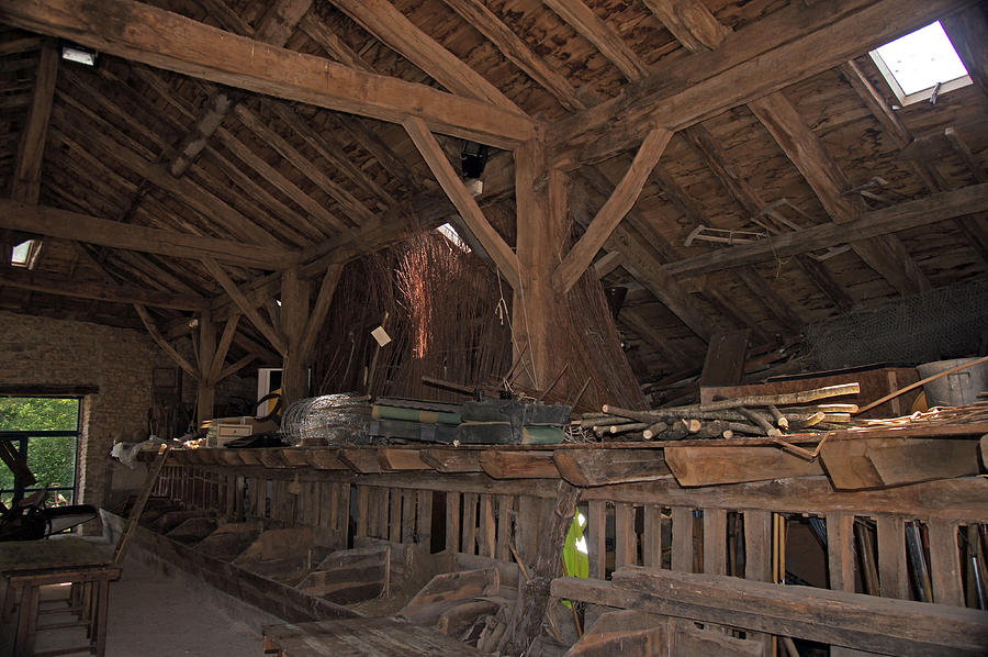 Inside a French barn Photograph by Rod Jones