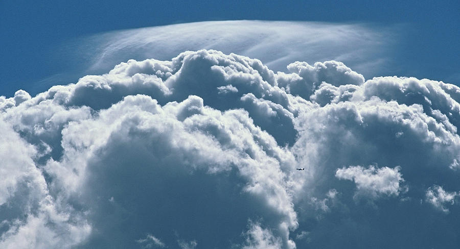 Clouds Photograph - Insignificance by Ron Romanosky