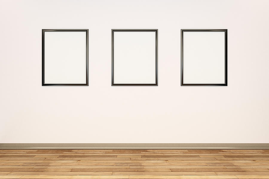 Interior Wall With Three Blank Picture Frames Photograph by Jon Boyes
