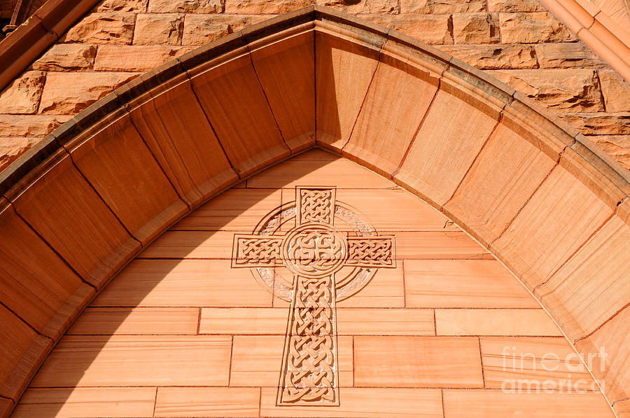 Architecture Photograph - Irish Celtic Cross Carved in Sandstone Above Historic Presbyterian Church Doorway  by Gary Whitton