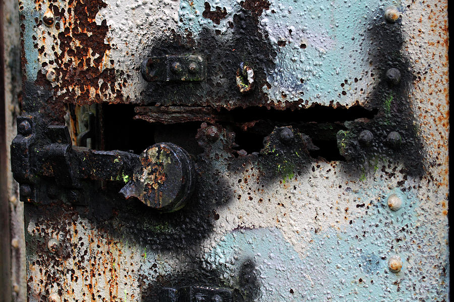 Iron Door Rusted Through Photograph by Marie Jamieson