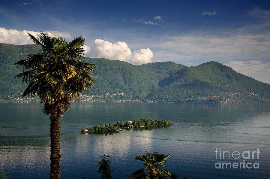 Islands on an alpine lake Photograph by Mats Silvan