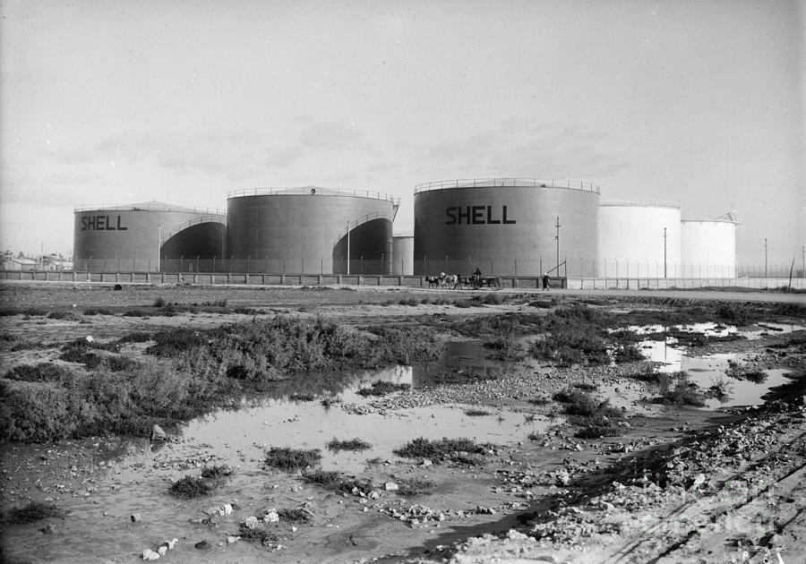 ISRAEL: OIL TANKS, c1934 Photograph by Granger