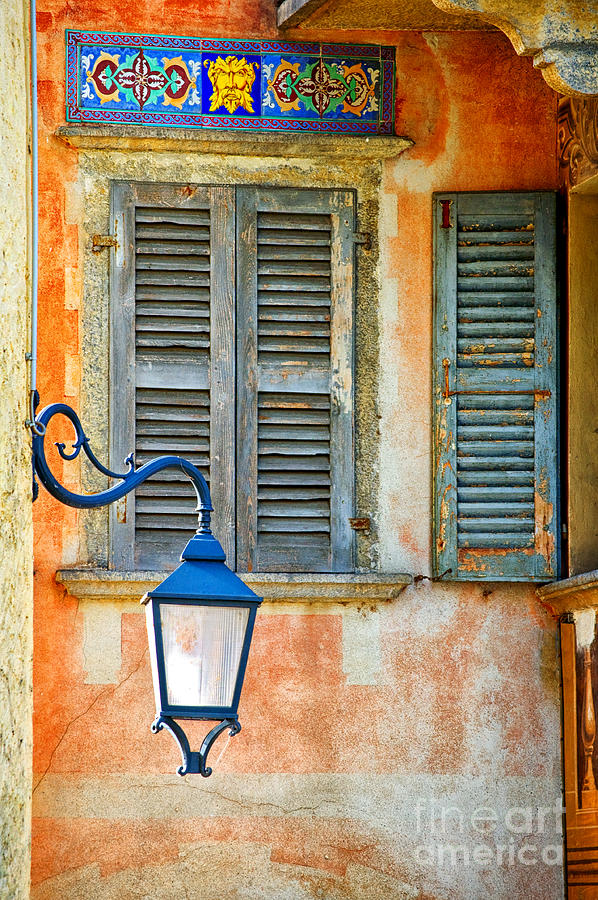 Architecture Photograph - Italian street lamp with window and decorated wall by Silvia Ganora